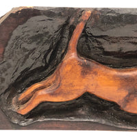 Relief Carved Leaping Puppy