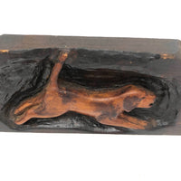 Relief Carved Leaping Puppy