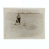 Painterly, Ethereal Old Snapshot of Young Woman with Sandcastle