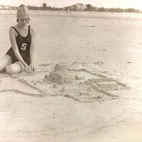 Painterly, Ethereal Old Snapshot of Young Woman with Sandcastle