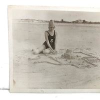 Painterly, Ethereal Old Snapshot of Young Woman with Sandcastle