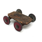 Very Sweet Little Homade Toy Cart with Red Wheels and Many Nails