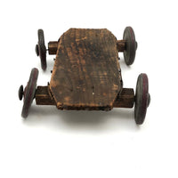 Very Sweet Little Homade Toy Cart with Red Wheels and Many Nails