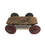 Very Sweet Little Homade Toy Cart with Red Wheels and Many Nails