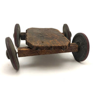 Very Sweet Little Homade Toy Cart with Red Wheels and Many Nails