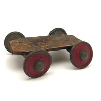 Very Sweet Little Homade Toy Cart with Red Wheels and Many Nails