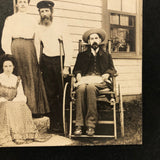 Curious Antique Photograph with Man in Wheelchair, Man on Crutches and Sickly Child