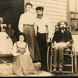 Curious Antique Photograph with Man in Wheelchair, Man on Crutches and Sickly Child