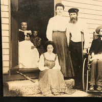 Curious Antique Photograph with Man in Wheelchair, Man on Crutches and Sickly Child