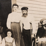 Curious Antique Photograph with Man in Wheelchair, Man on Crutches and Sickly Child