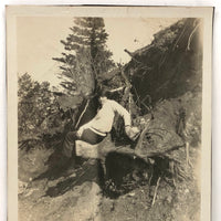 Many Times Awkward, Vintage Snapshot of Young Person Posing on Uprooted Trunk