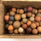 Old Wooden Box Filled with Antique Clay Marbles