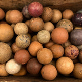 Old Wooden Box Filled with Antique Clay Marbles