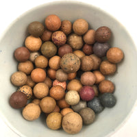 Old Wooden Box Filled with Antique Clay Marbles