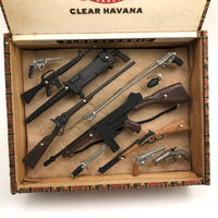 Butterfly-esque Cigar Box Toy Gun Collection