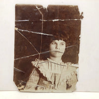 Striking Torn Up and Taped Back Together Old Photo of Girl Looking Sideward