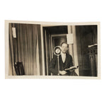 Wonderful c. late 20s/early 30s Snapshot of Man at Microphone Framed in Verticals