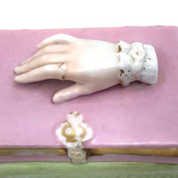 Book Shaped Porcelain Inkwell with Resting (But Poised to Write) Hand