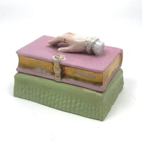 Book Shaped Porcelain Inkwell with Resting (But Poised to Write) Hand