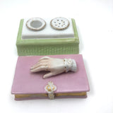 Book Shaped Porcelain Inkwell with Resting (But Poised to Write) Hand