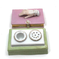 Book Shaped Porcelain Inkwell with Resting (But Poised to Write) Hand