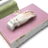 Book Shaped Porcelain Inkwell with Resting (But Poised to Write) Hand