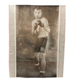 Photo of Photo of Young Boxer Against Lined Paper