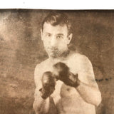 Photo of Photo of Young Boxer Against Lined Paper