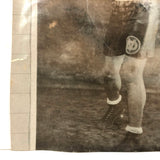 Photo of Photo of Young Boxer Against Lined Paper