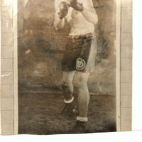 Photo of Photo of Young Boxer Against Lined Paper