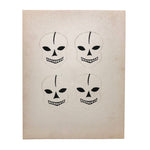 Excellent Untouched Set of Four c. 1930s Die Cut Skulls