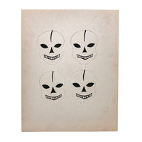 Excellent Untouched Set of Four c. 1930s Die Cut Skulls