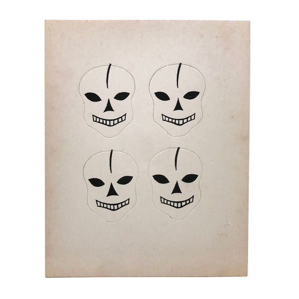 Excellent Untouched Set of Four c. 1930s Die Cut Skulls