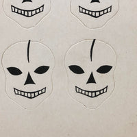 Excellent Untouched Set of Four c. 1930s Die Cut Skulls