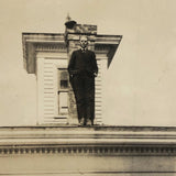 Man at Edge of Roof, Old Snapshot with Black Paper Backing