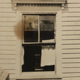 Man at Edge of Roof, Old Snapshot with Black Paper Backing