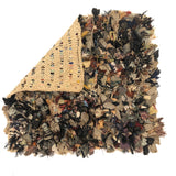 Great Old Confetti Mat on Unusual Crocheted Structure