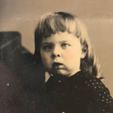 Holding On: Unusual Composition, Unusual Looking Child, Striking Antique Sixth Plate Tintype