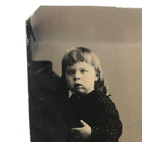 Holding On: Unusual Composition, Unusual Looking Child, Striking Antique Sixth Plate Tintype