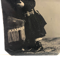 Holding On: Unusual Composition, Unusual Looking Child, Striking Antique Sixth Plate Tintype