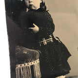 Holding On: Unusual Composition, Unusual Looking Child, Striking Antique Sixth Plate Tintype