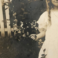 Girl with Rose, Huge Bow and Excellent Smile, 1909 RPPC (with Flag Cancellation)