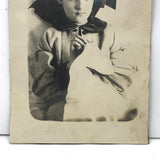 Knowing (and Rather Vampiric) Looking Girl Sewing, Antique Photo