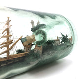 Wonderful Old Folk Art Ship in a Bottle with Little Houses, Flags, and Tower Perched on Push Up Bottom