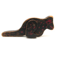 Exuberanty Painted Red and Black Wooden Toy Creature