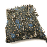 As Found, Old Handmade Pincushion with Many Safety Pins