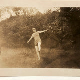 Suspended Gesture, In Between, Old Snapshot Photo of Woman in Swim Costume