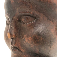 Antique Hand-Carved Frowning Woman