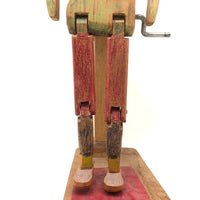 Crayon Colored Leprechaun-esque Jig Doll on Platform with Crank!