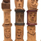 Curious Lot of Heads Hand-carved from Old Spools